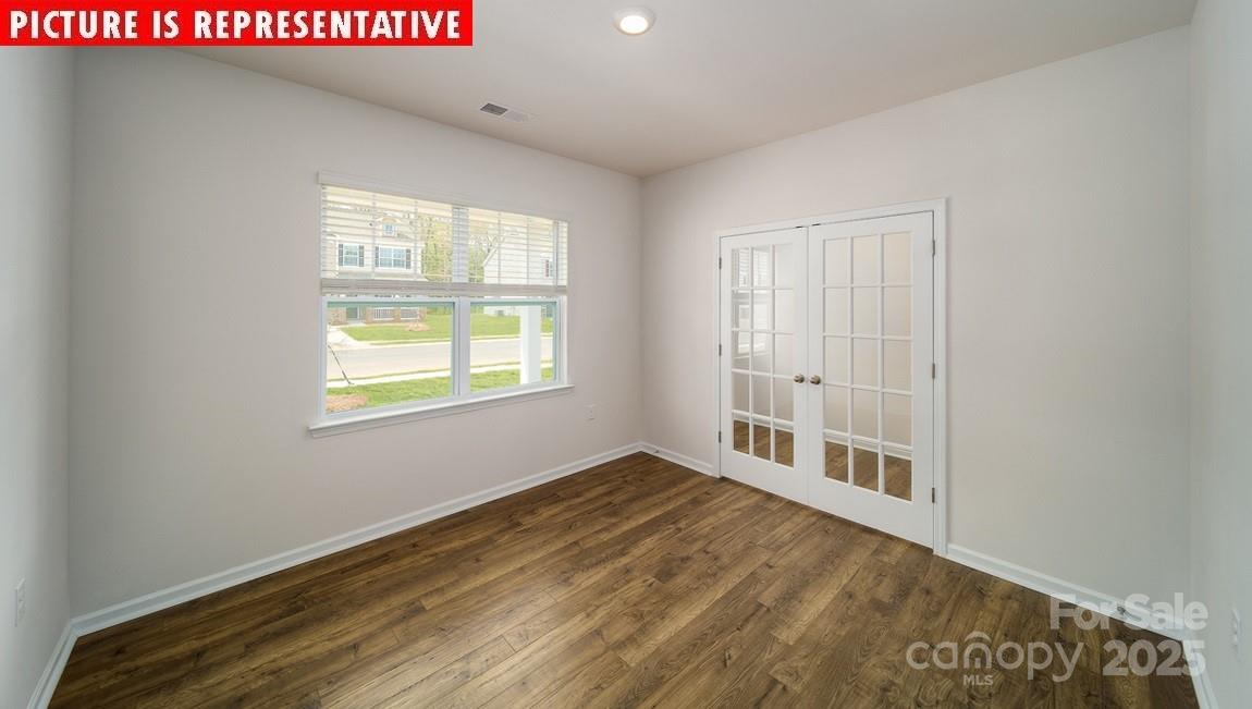 3751 Cullen Meadows Drive Davidson, NC 28036 - Photo 3 of 28 a view of an empty room with a window