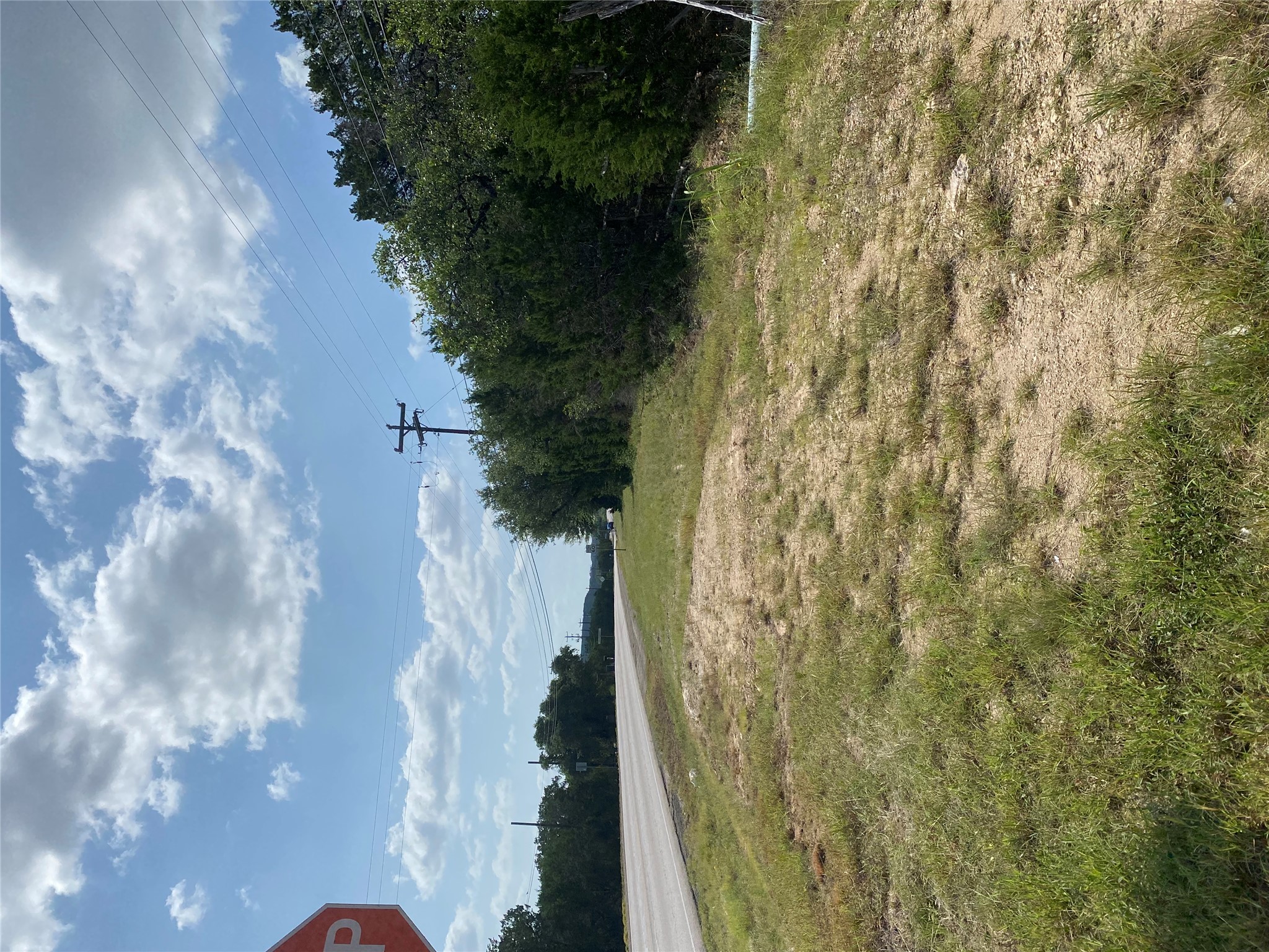 Tbd Tbd Fm 3237/whisper Ridge Wimberley, TX 78676 - Photo 5 of 10 A spacious lot provides ample opportunity for a dream home or business by the road.