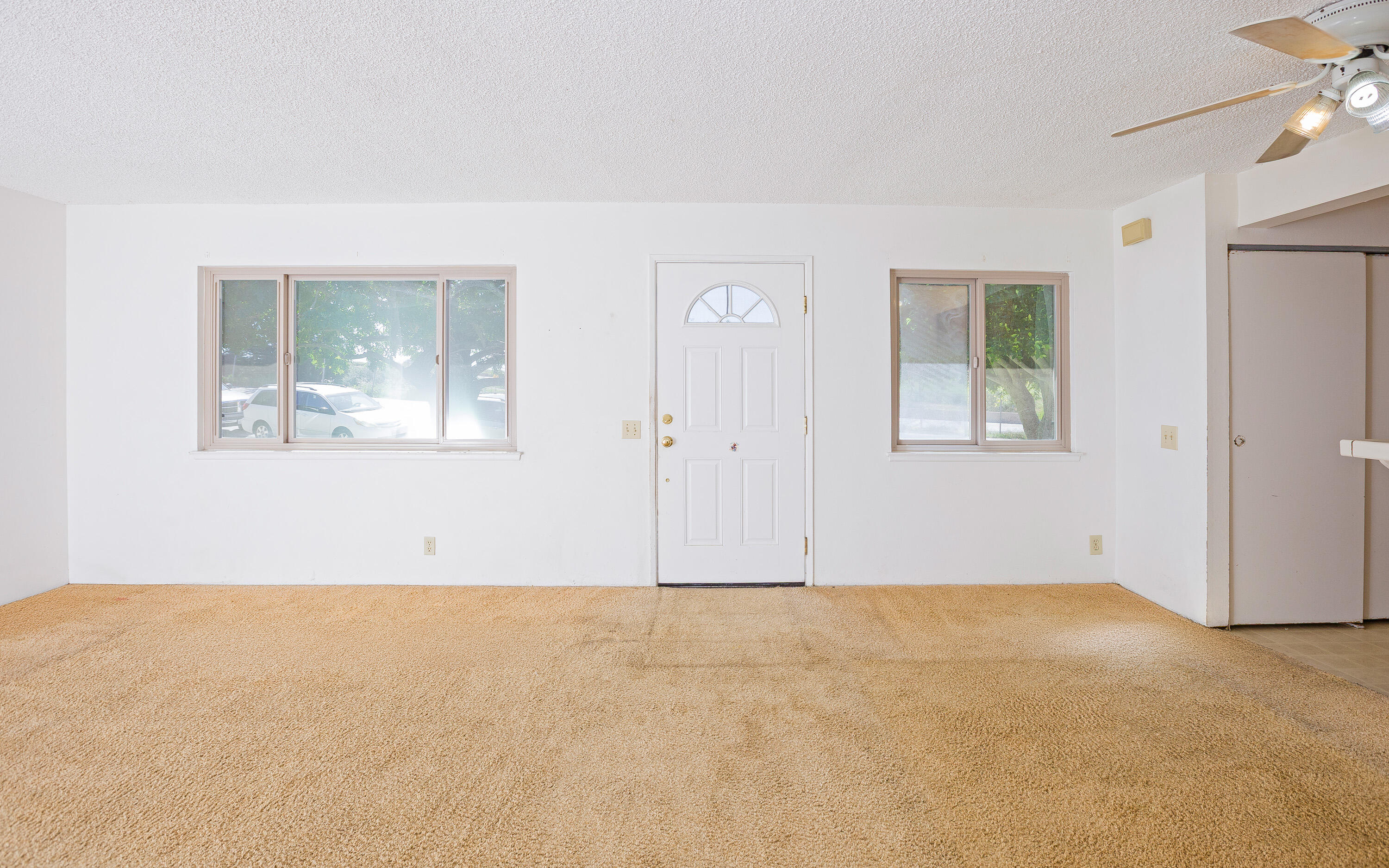 5910 Via Real, Unit 1 Carpinteria, CA 93013 - Photo 5 of 29 Entry, Living & Dining Rooms