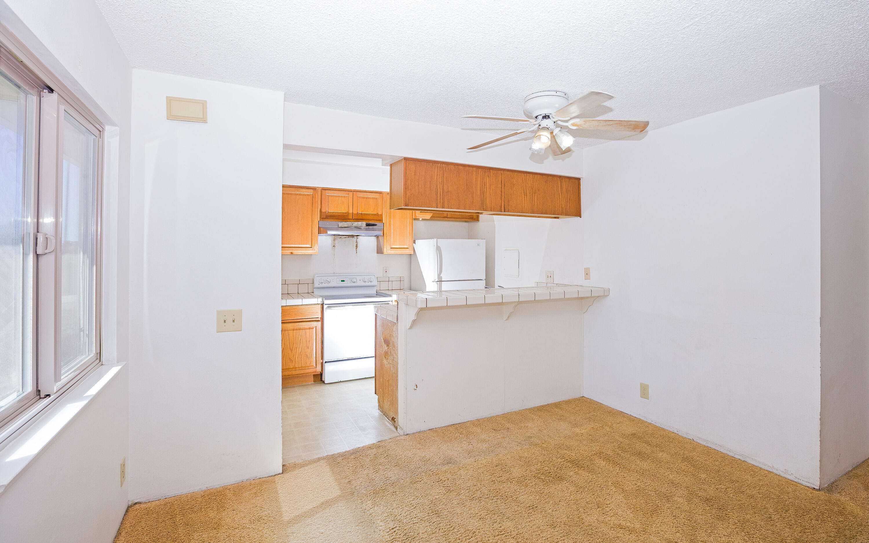 5910 Via Real, Unit 1 Carpinteria, CA 93013 - Photo 6 of 29 Dining Room to Galley Kitchen