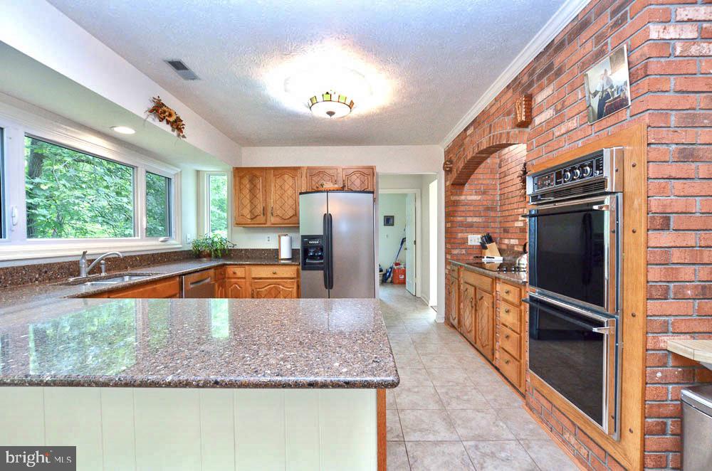 18 Carrollton Road Sterling, VA 20165 - Photo 11 of 45 Stainless steel refrigerator and new dishwasher