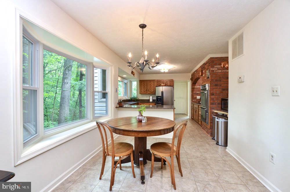 18 Carrollton Road Sterling, VA 20165 - Photo 13 of 45 Breakfast nook with large bay window