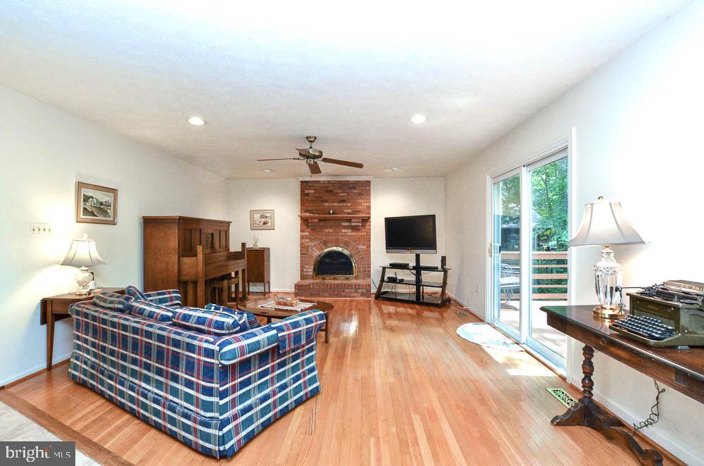18 Carrollton Road Sterling, VA 20165 - Photo 15 of 45 Gleaming hardwood flooring in family room