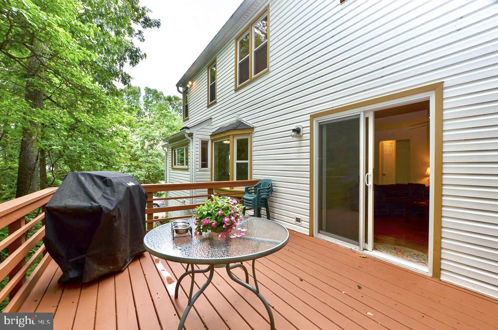 18 Carrollton Road Sterling, VA 20165 - Photo 19 of 45 Deck extends outdoor cooking and entertaining