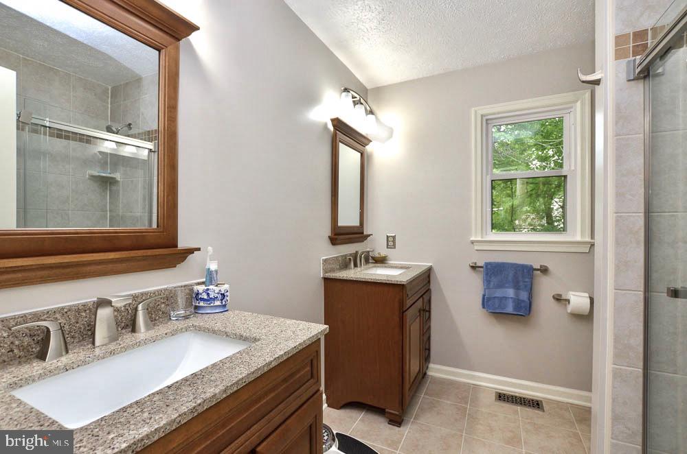 18 Carrollton Road Sterling, VA 20165 - Photo 23 of 45 Recently remodeled ensuite master bathroom