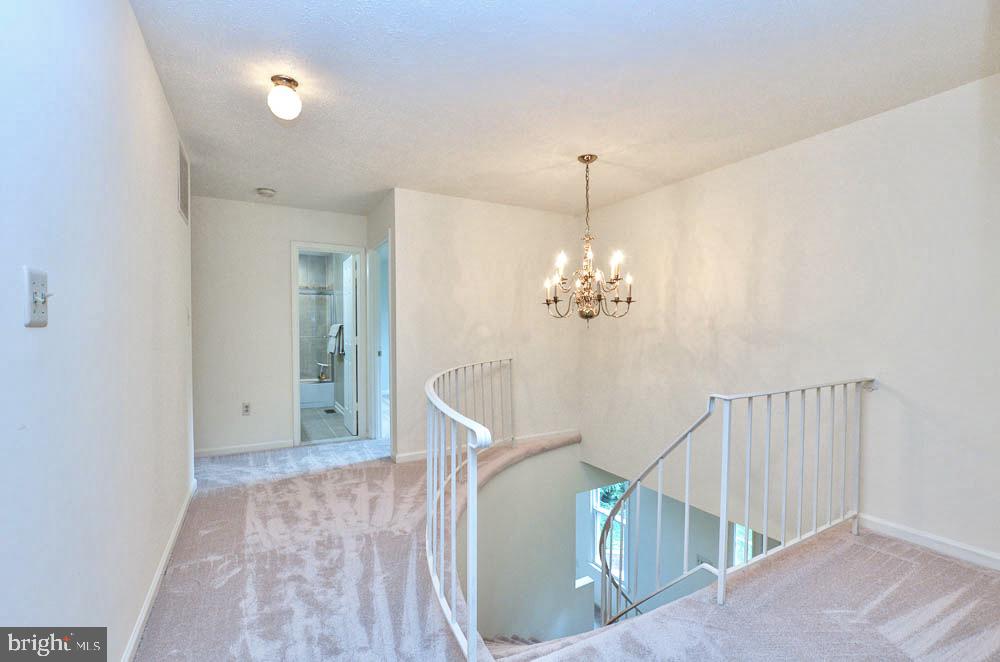 18 Carrollton Road Sterling, VA 20165 - Photo 30 of 45 New carpet throughout upper level and stairway