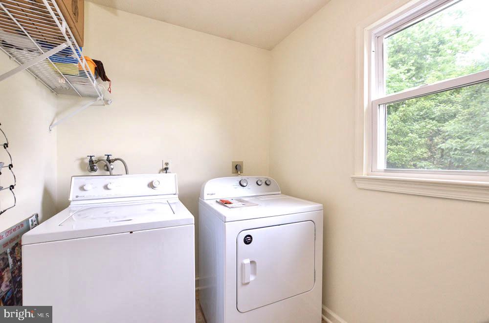 18 Carrollton Road Sterling, VA 20165 - Photo 34 of 45 Main level laundry with new dryer