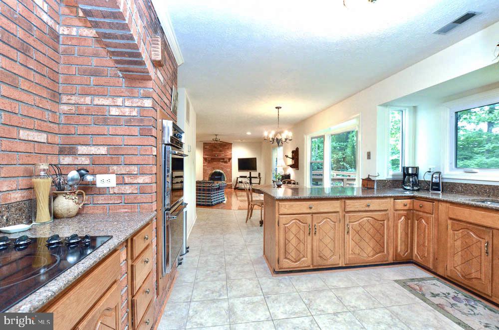 18 Carrollton Road Sterling, VA 20165 - Photo 10 of 45 Gourmet kitchen with great back yard views