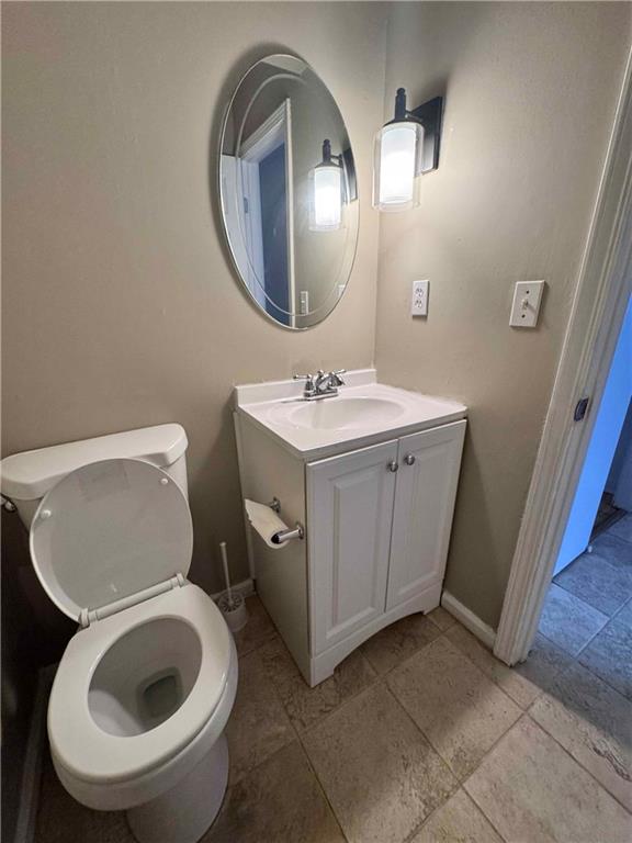 3091 Colonial Way, Unit 3 Atlanta, GA 30341 - Photo 15 of 34 a bathroom with a toilet sink and mirror