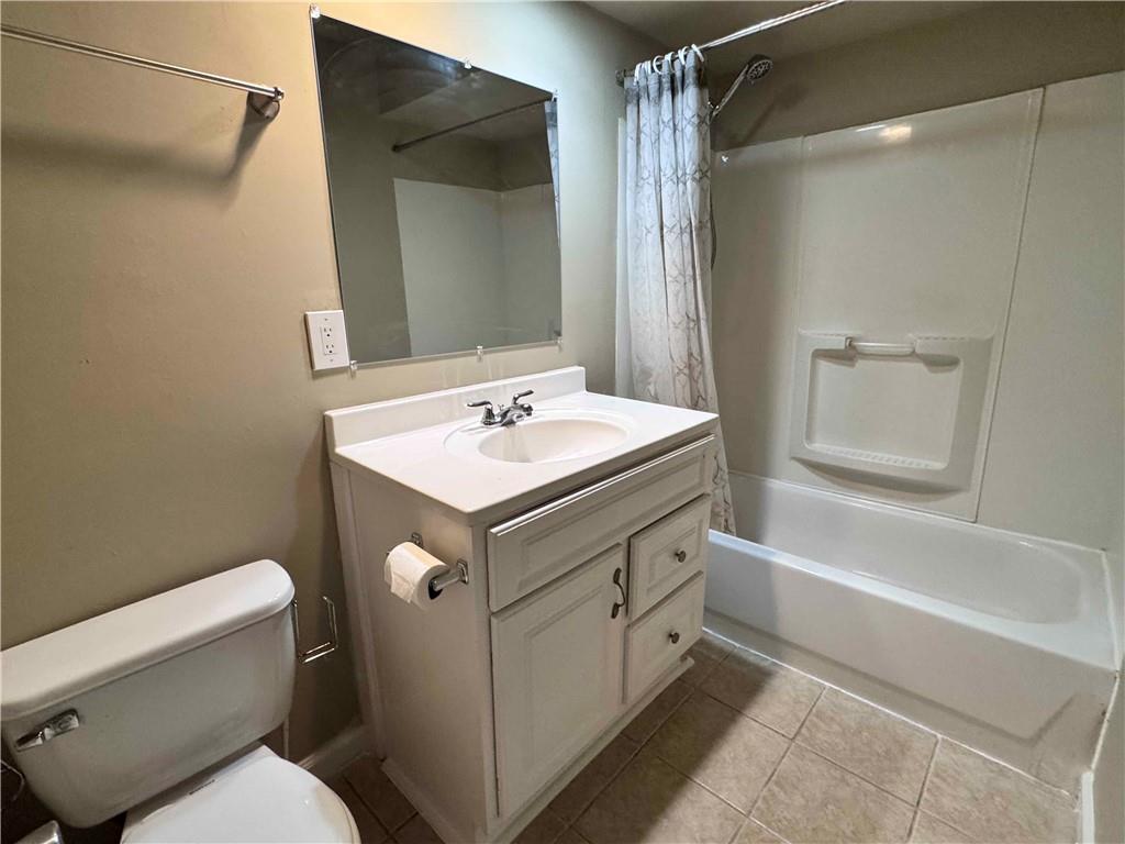 3091 Colonial Way, Unit 3 Atlanta, GA 30341 - Photo 19 of 34 a bathroom with a sink toilet vanity and shower
