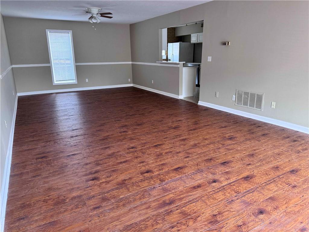 3091 Colonial Way, Unit 3 Atlanta, GA 30341 - Photo 7 of 34 wooden floor in an empty room