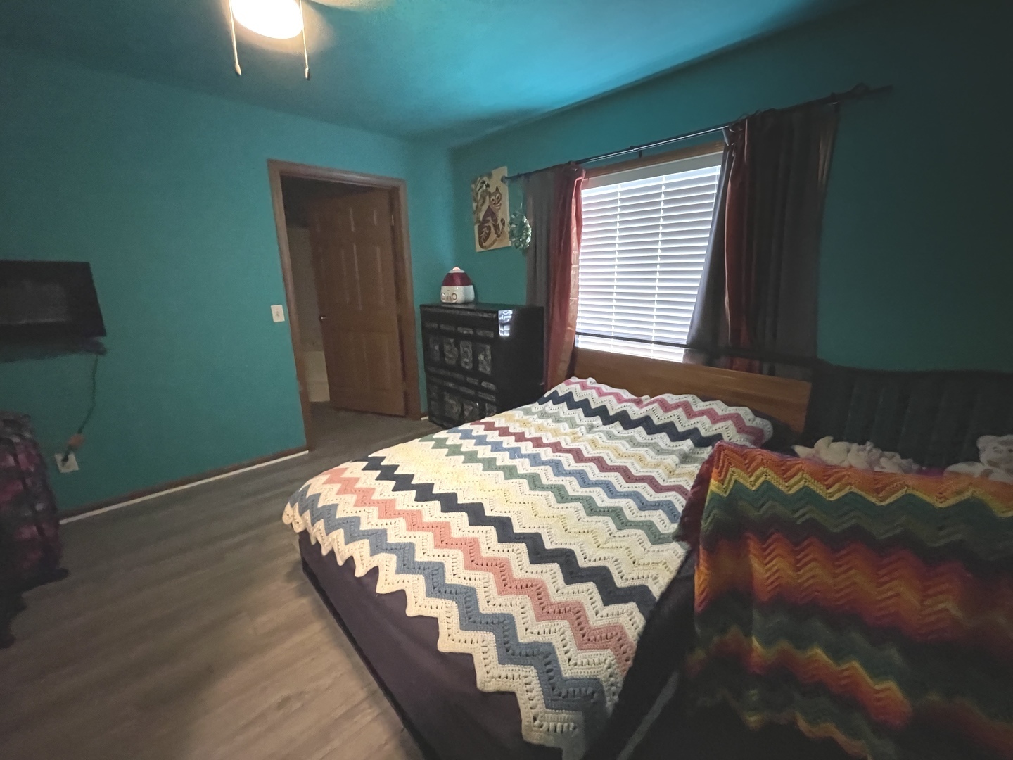 799 Searls Road Amboy, IL 61310 - Photo 15 of 23 a bedroom with a bed and a window
