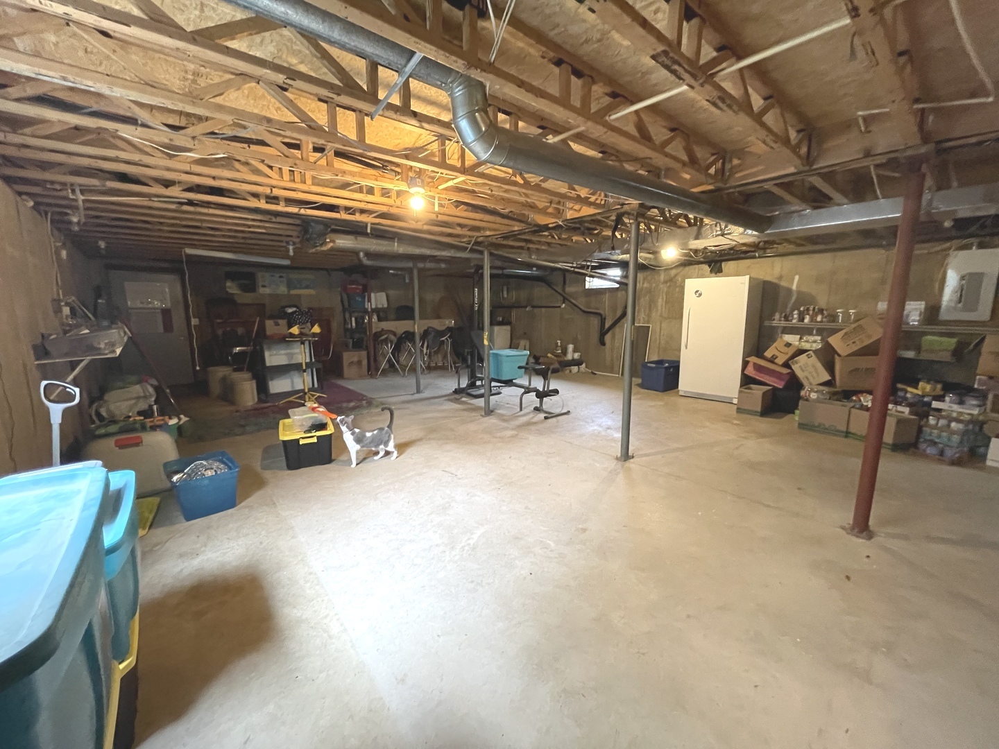 799 Searls Road Amboy, IL 61310 - Photo 23 of 23 a view of a garage with a table and chairs