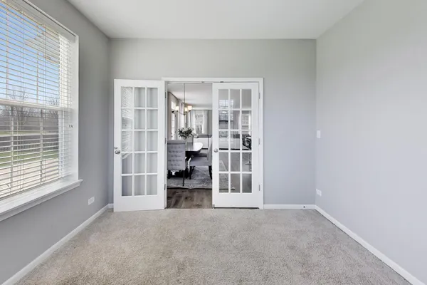 a view of empty room with front door
