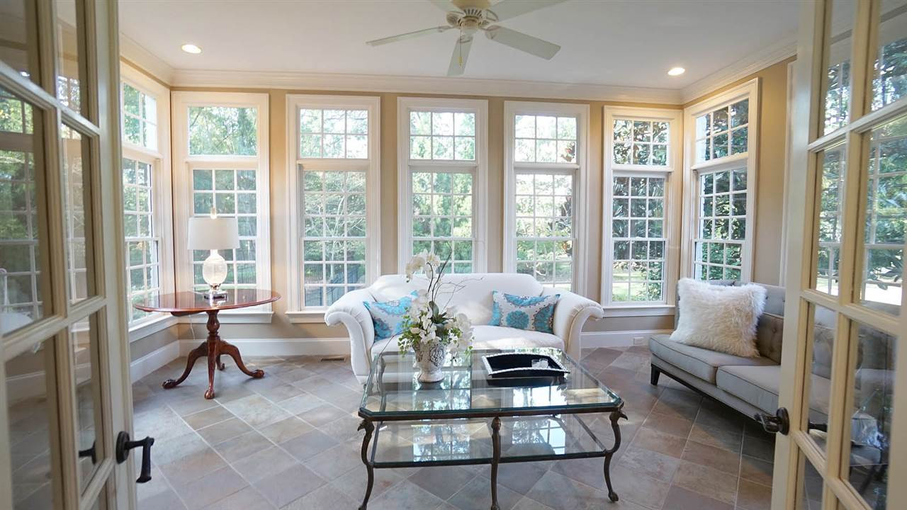 12512 Bayleaf Church Road Raleigh, NC 27614 - Photo 18 of 30 Beautiful sunroom off family room. Perfect for reading a book, office, napping, or could be great main level kids area Sunroom