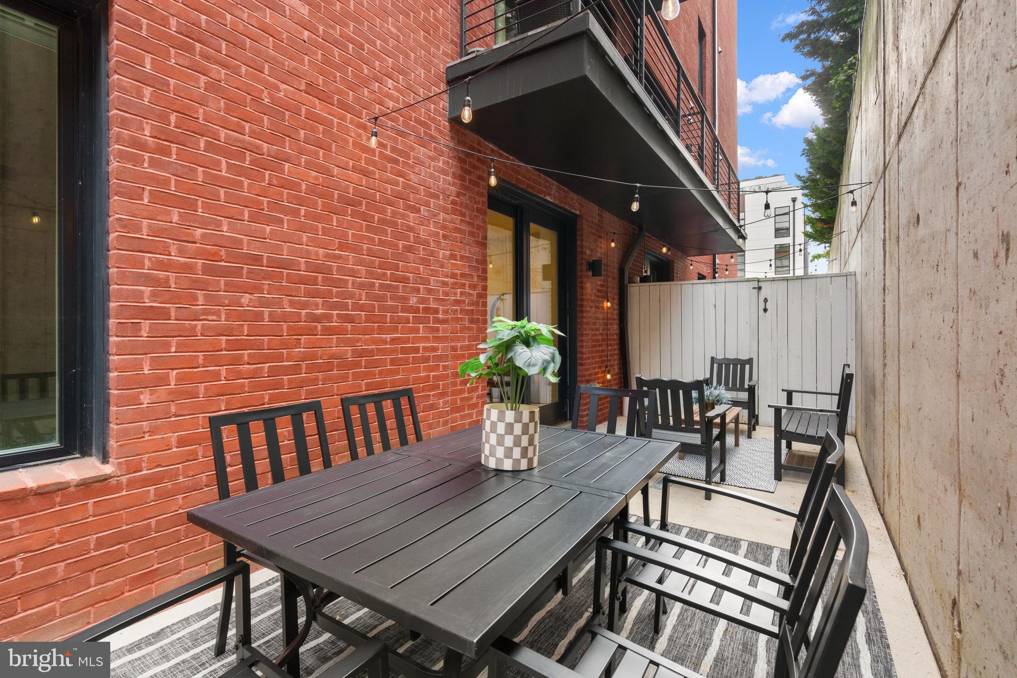 1412 Chapin Street Northwest, Unit 3 Washington, DC 20009 - Photo 1 of 25 a view of a outdoor seating area with furniture