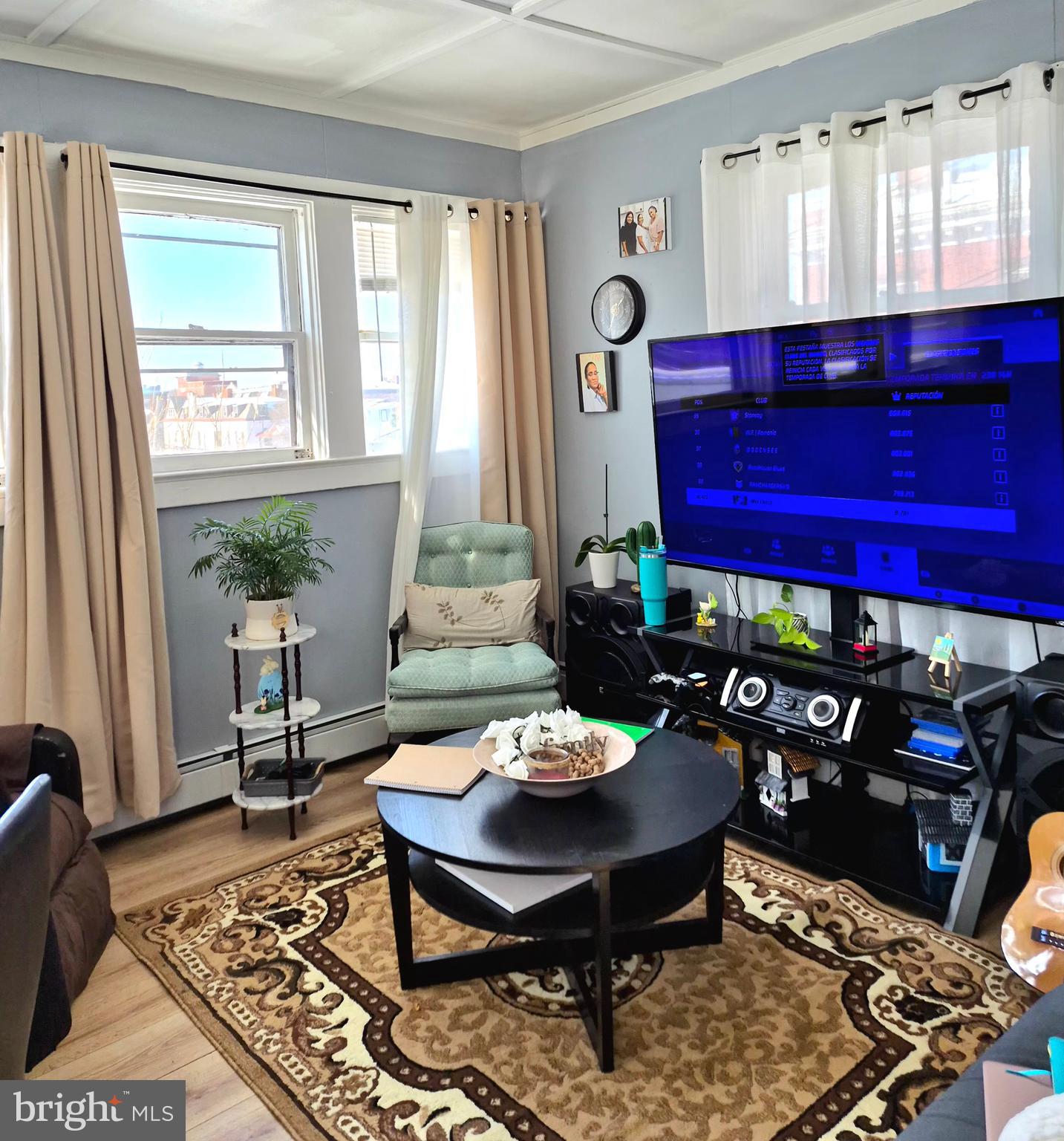 220 North 6th Street Reading, PA 19601 - Photo 2 of 30 a view of a dining room with furniture window and wooden floor