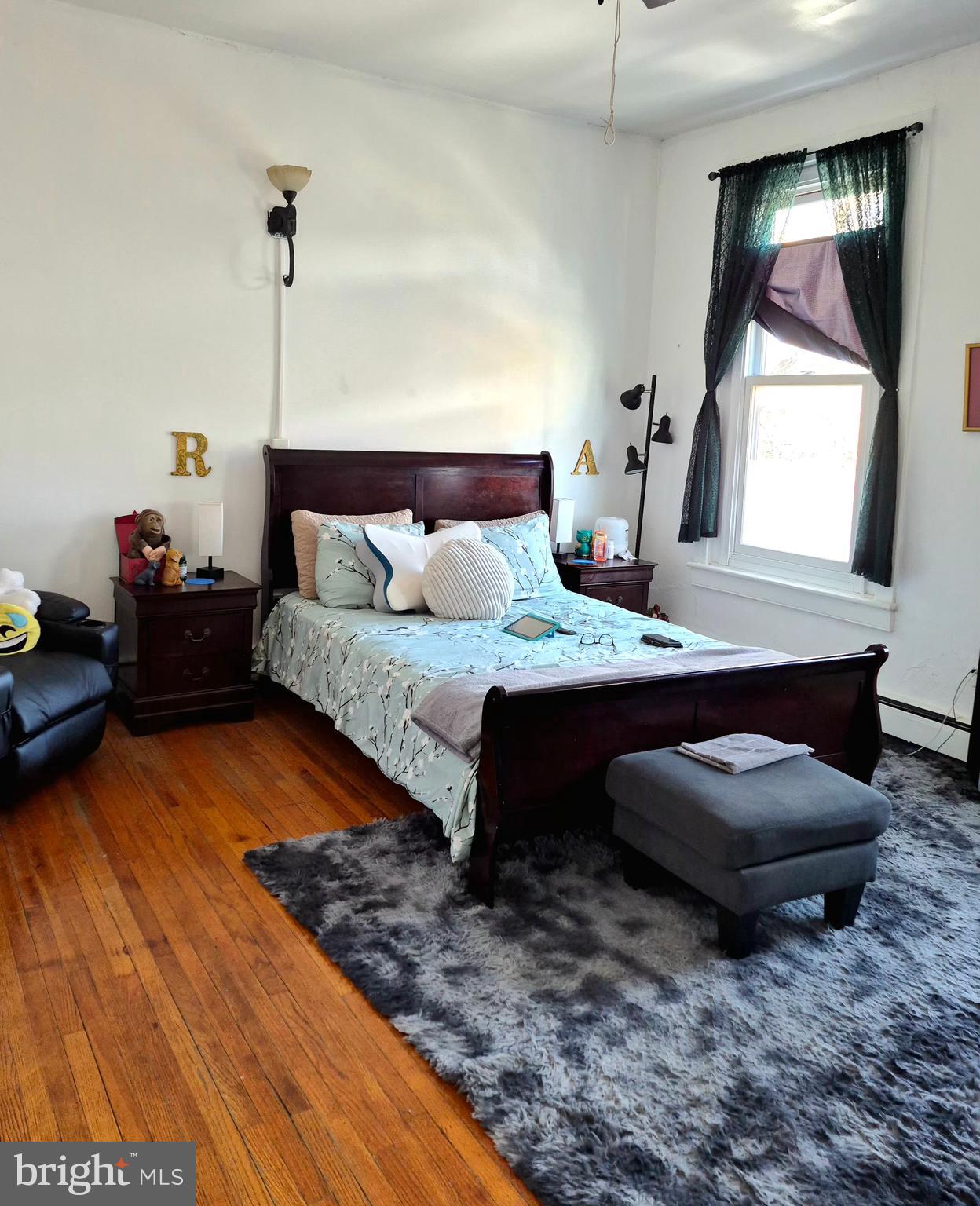 220 North 6th Street Reading, PA 19601 - Photo 8 of 30 a bedroom with a bed window and dresser