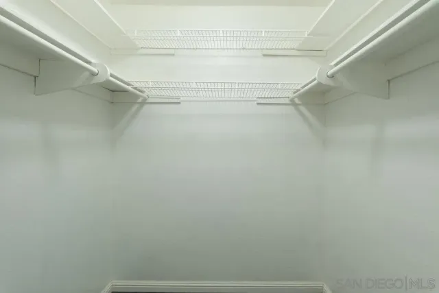 a view of a room with racks on the wall