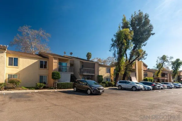 a view of a car is parked in front of house