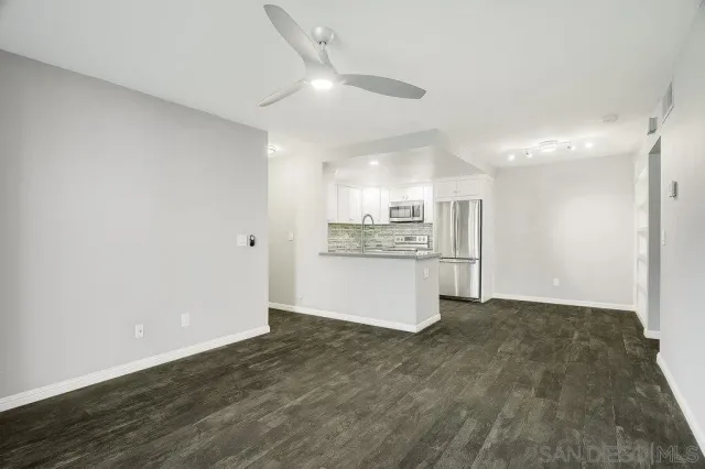 a view of kitchen with wooden floor