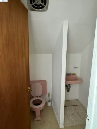 a bathroom with a sink a toilet