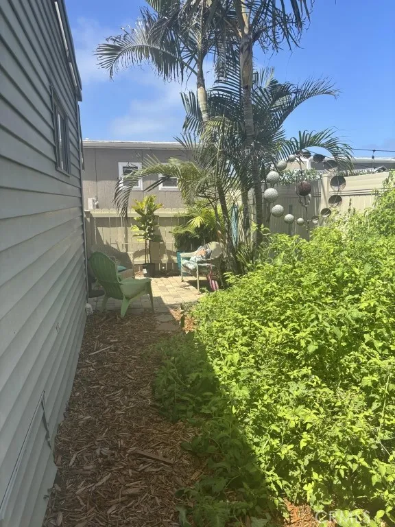 6550 Ponto, Unit 76 Carlsbad, CA 92011 - Photo 12 of 25 a view of outdoor space yard and swimming pool