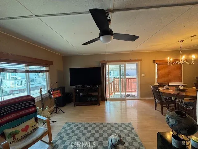 a kitchen with stainless steel appliances a refrigerator a sink and cabinets