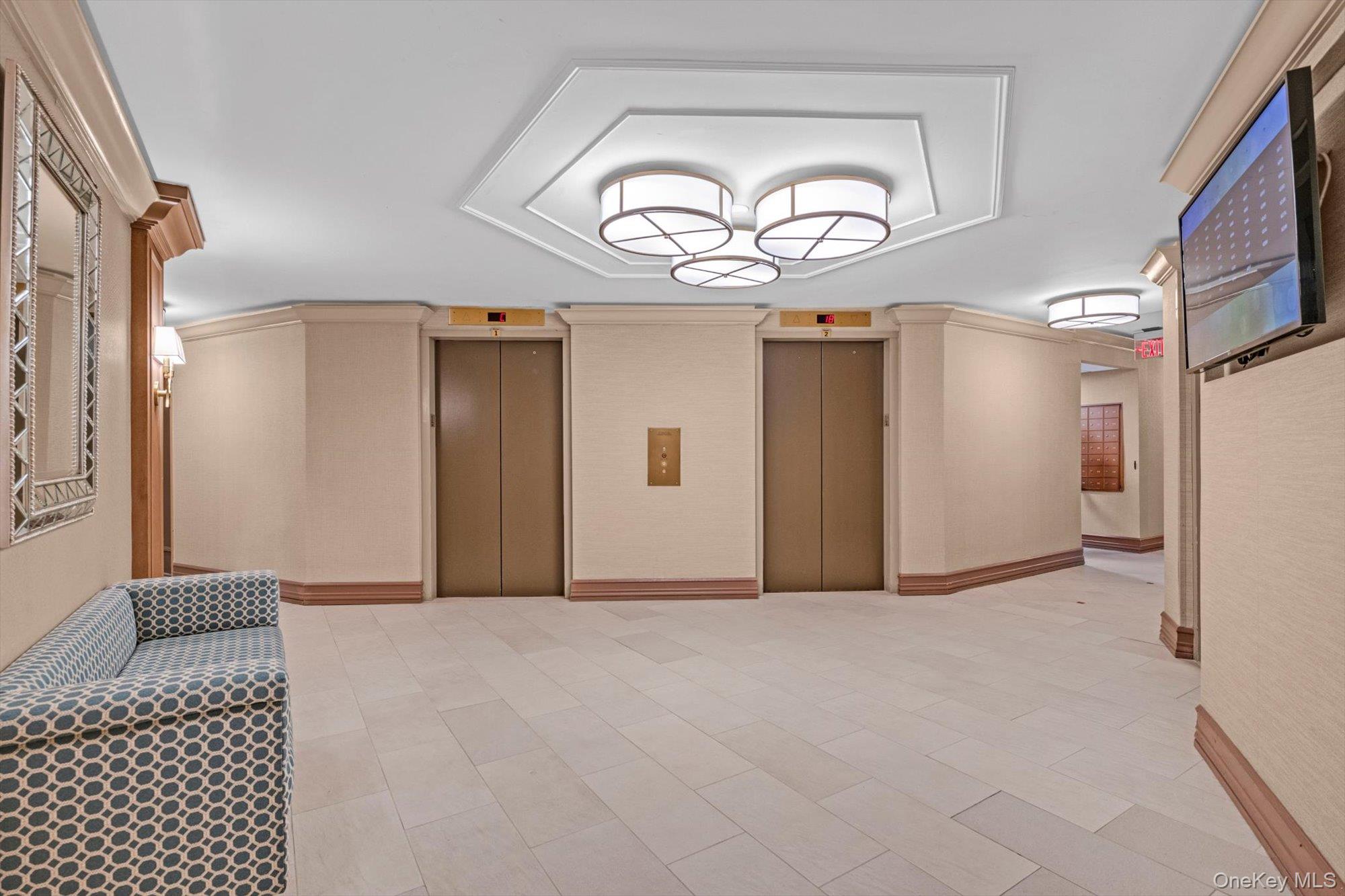 1 Bay Club Drive, Unit 8J Queens, NY 11360 - Photo 11 of 17 a view of empty room with wooden floor