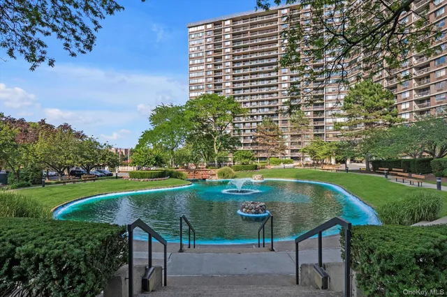 a view of swimming pool from a yard