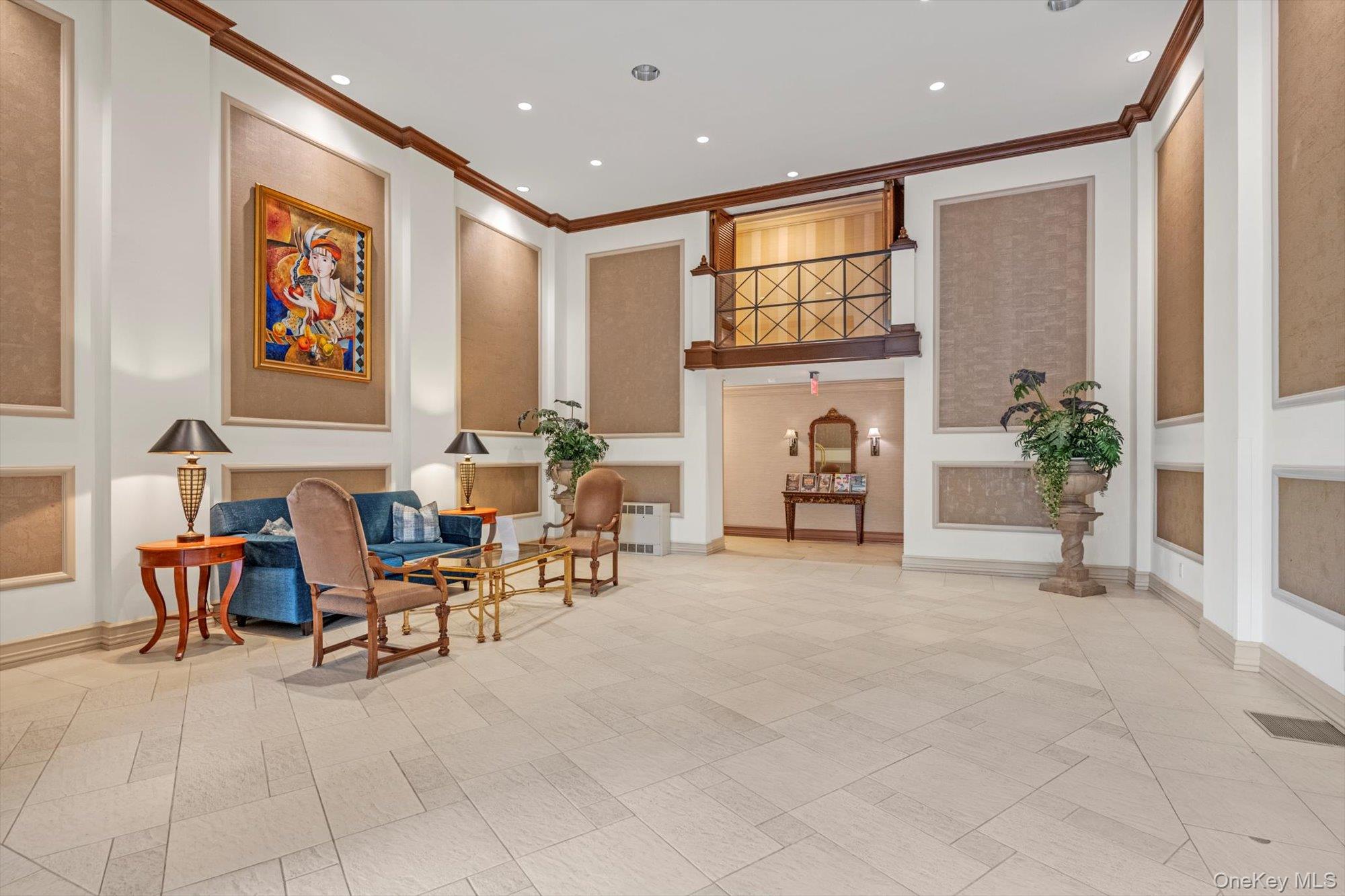 1 Bay Club Drive, Unit 8J Queens, NY 11360 - Photo 10 of 17 a view of a livingroom with furniture and a potted plant