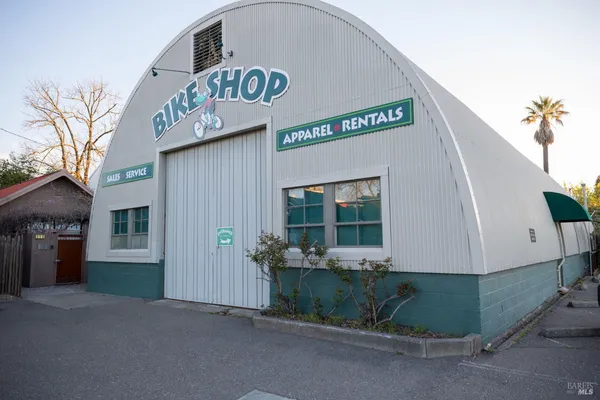a view of a car park in front of a building