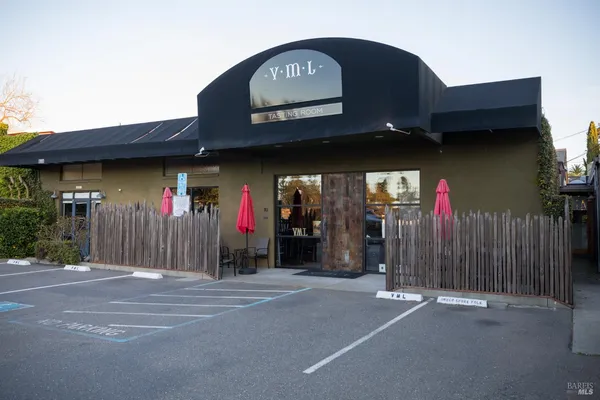 a view of a park with sitting area