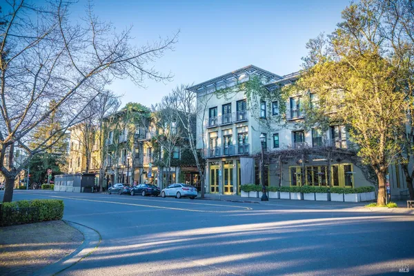 a front view of a building with street view