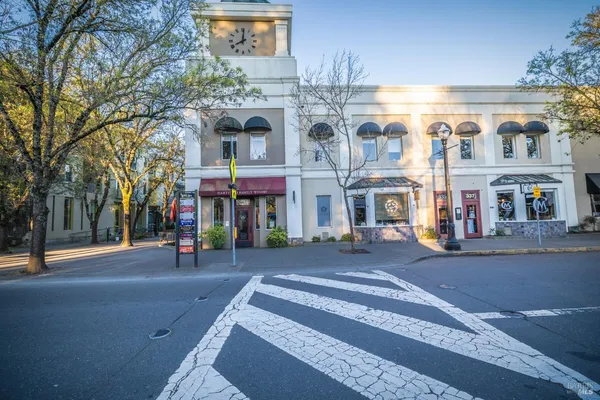 a view of a building with a tree