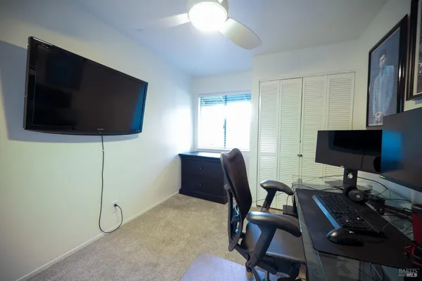 a view of a workspace with furniture