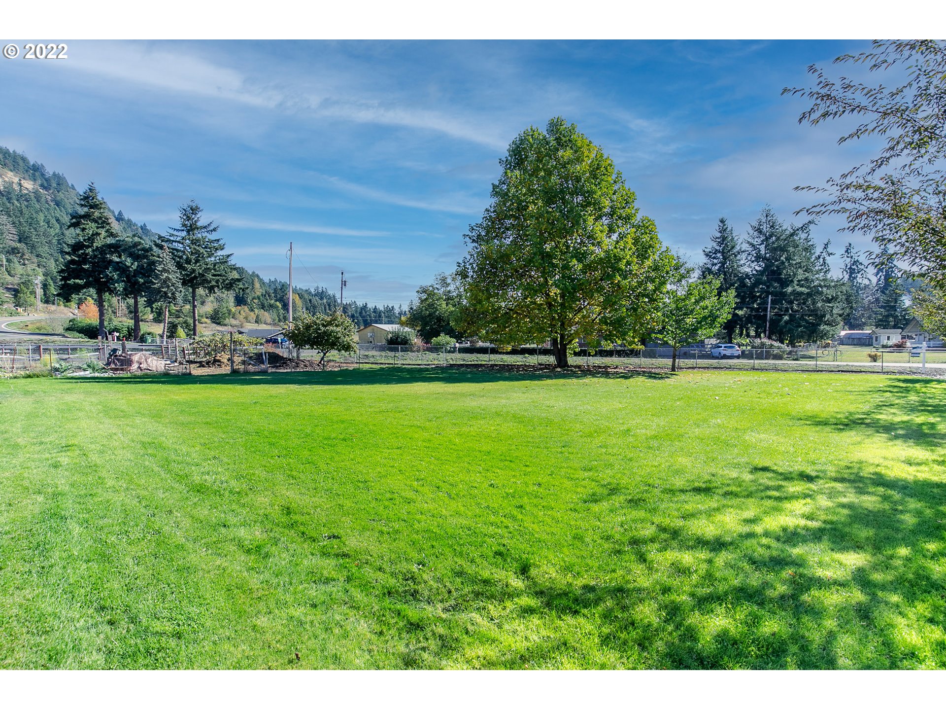 34785 Row River Road Cottage Grove, OR 97424 - Photo 13 of 31 a view of yard with swimming pool and green space
