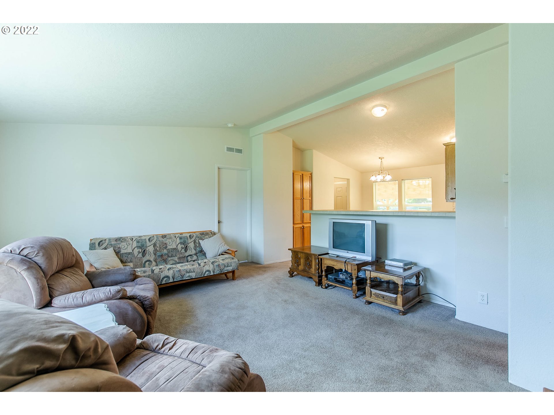 34785 Row River Road Cottage Grove, OR 97424 - Photo 20 of 31 a living room with furniture and a window