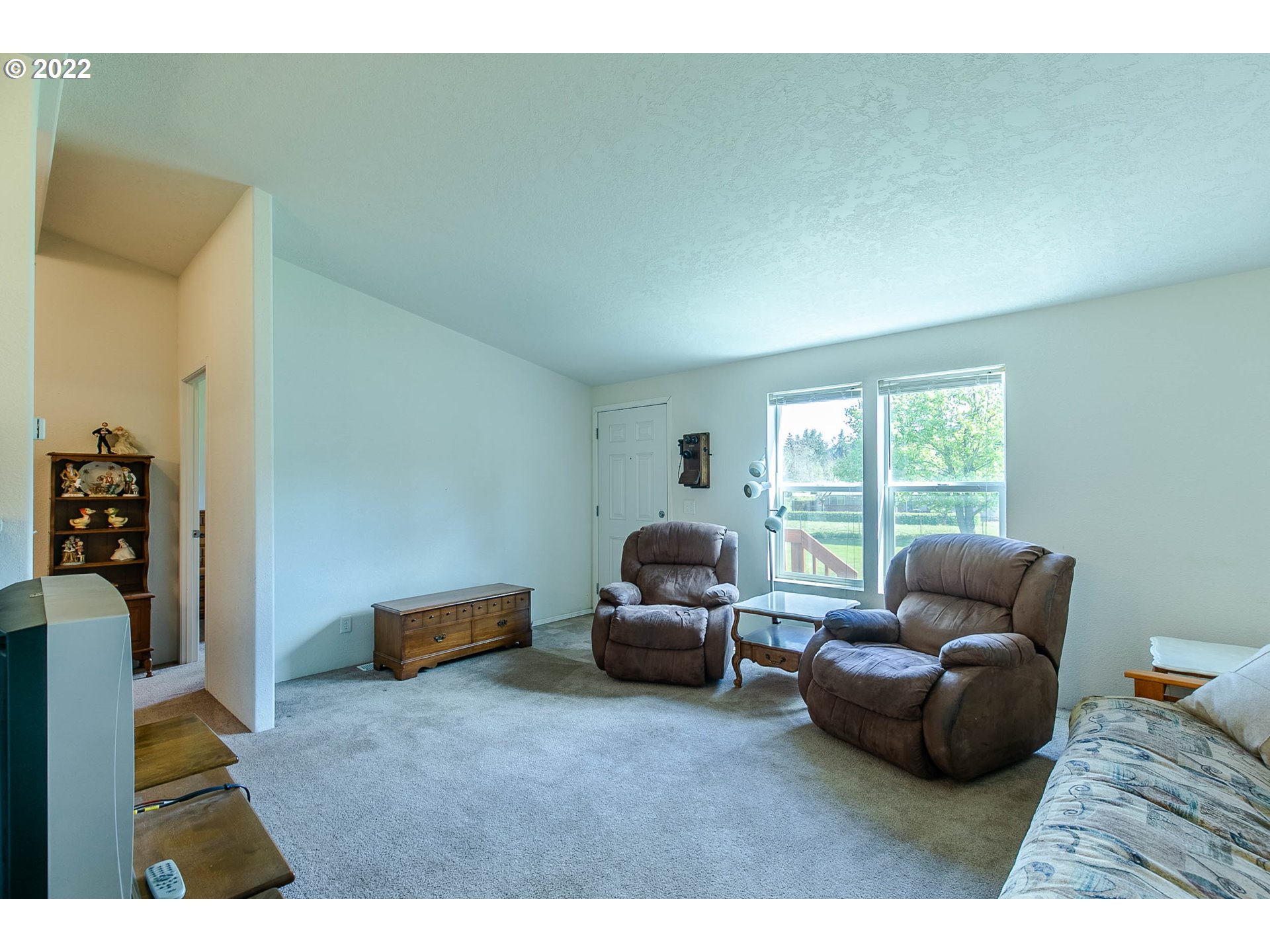34785 Row River Road Cottage Grove, OR 97424 - Photo 21 of 31 a living room with furniture and a window