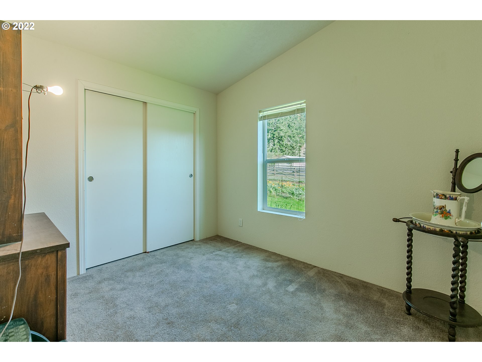 34785 Row River Road Cottage Grove, OR 97424 - Photo 28 of 31 a view of an empty room with a window