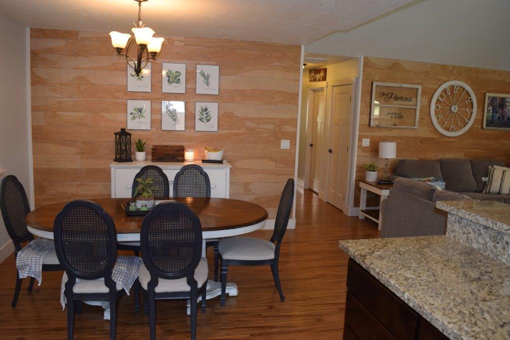 906 Win Way Eagle Point, OR 97524 - Photo 7 of 33 a dining room with furniture and window