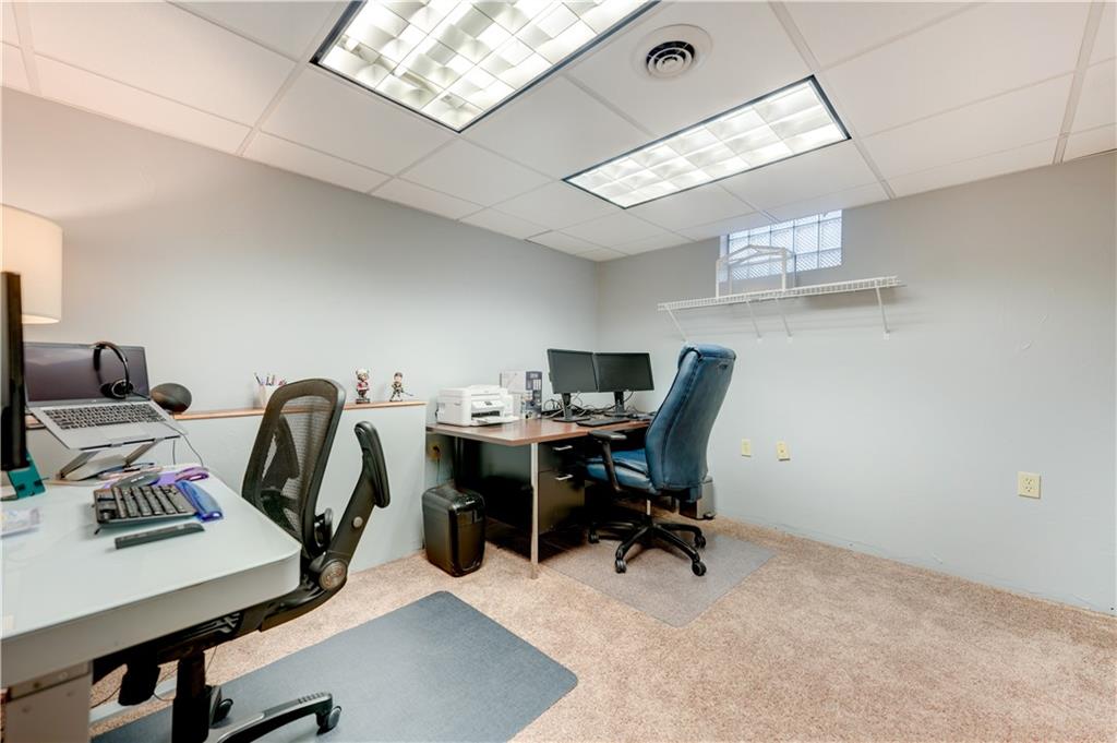 5618 Aiken Road McKees Rocks, PA 15136 - Photo 16 of 22 a view of a workspace with furniture and a window