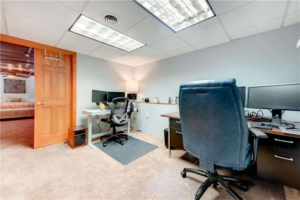 5618 Aiken Road McKees Rocks, PA 15136 - Photo 17 of 22 a view of a workspace with furniture and a livingroom