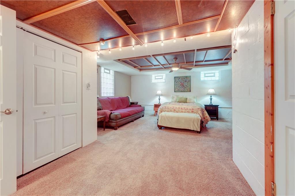 5618 Aiken Road McKees Rocks, PA 15136 - Photo 19 of 22 a room with furniture and a lamp