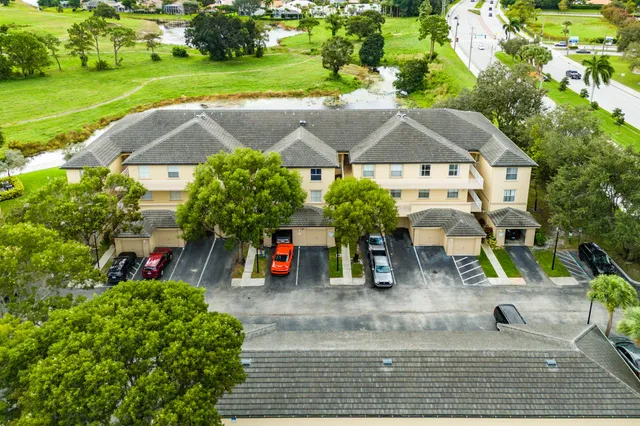 an aerial view of a house with garden