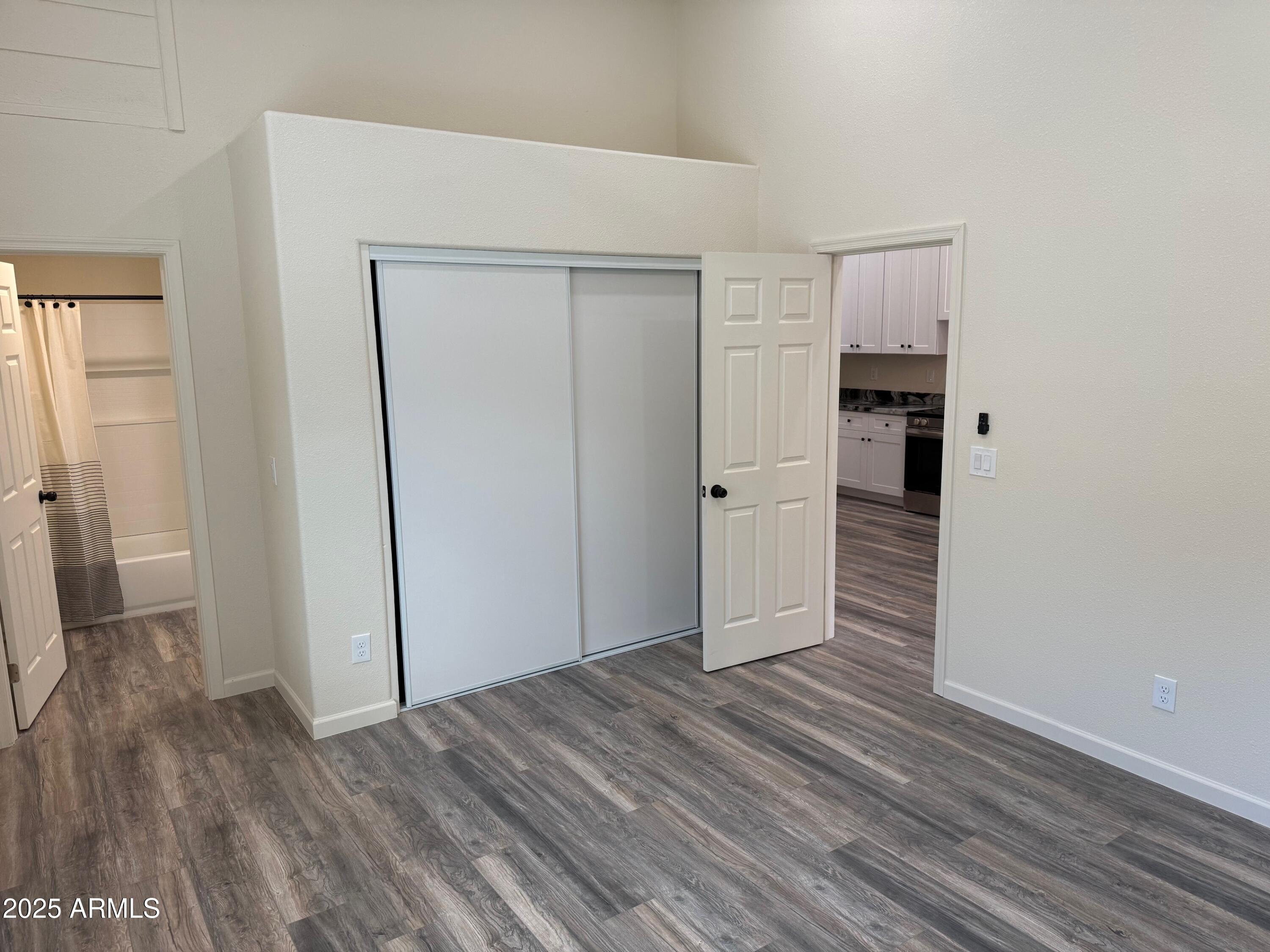 217 West Estate Lane Payson, AZ 85541 - Photo 6 of 8 a view of empty room with wooden floor