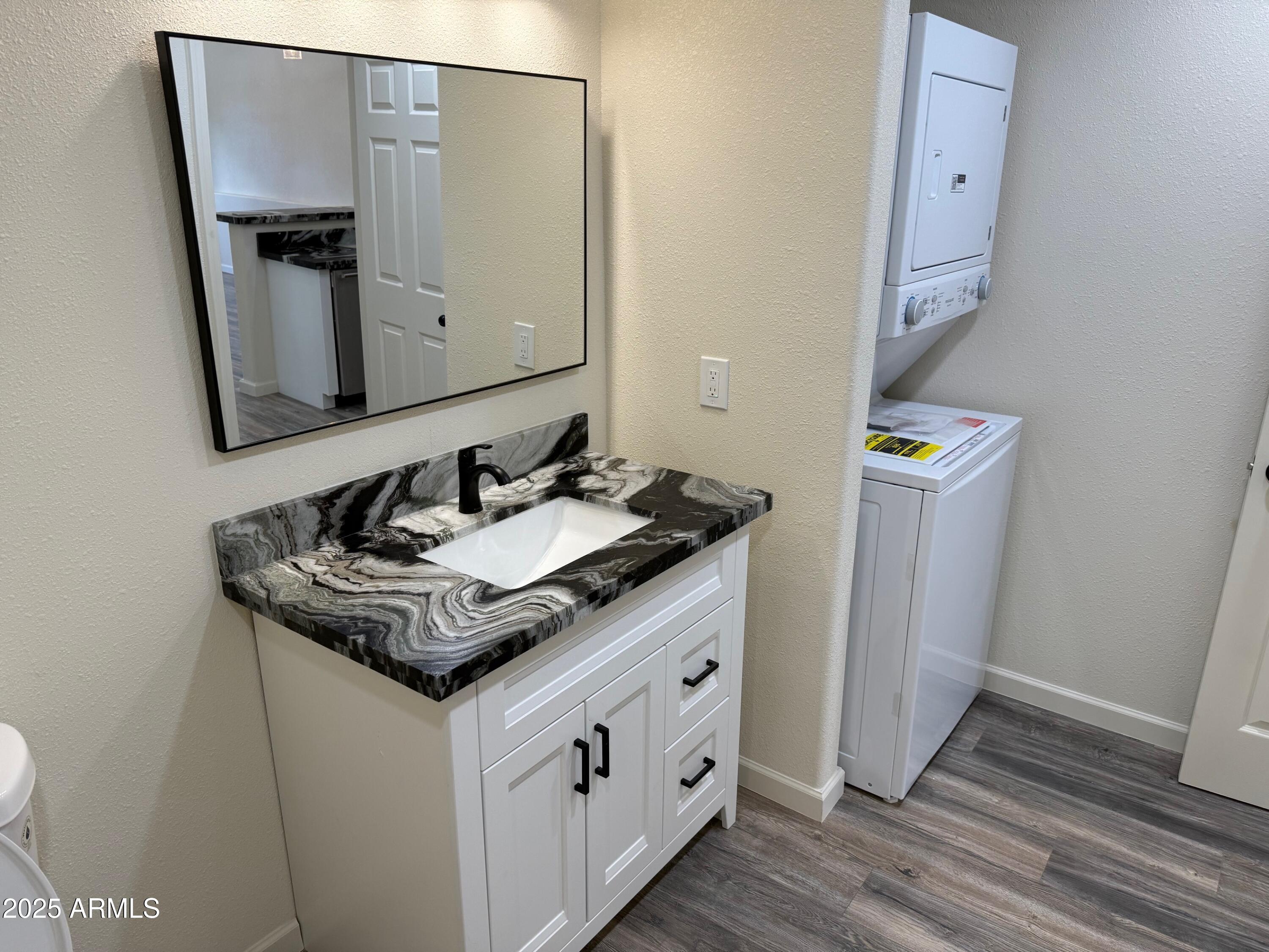 217 West Estate Lane Payson, AZ 85541 - Photo 8 of 8 a bathroom with a sink and a mirror