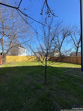 a view of yard with an outdoor space