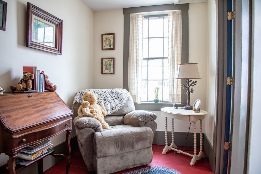 59 Petersham Road Hardwick, MA 01037 - Photo 30 of 38 a living room with furniture and a window