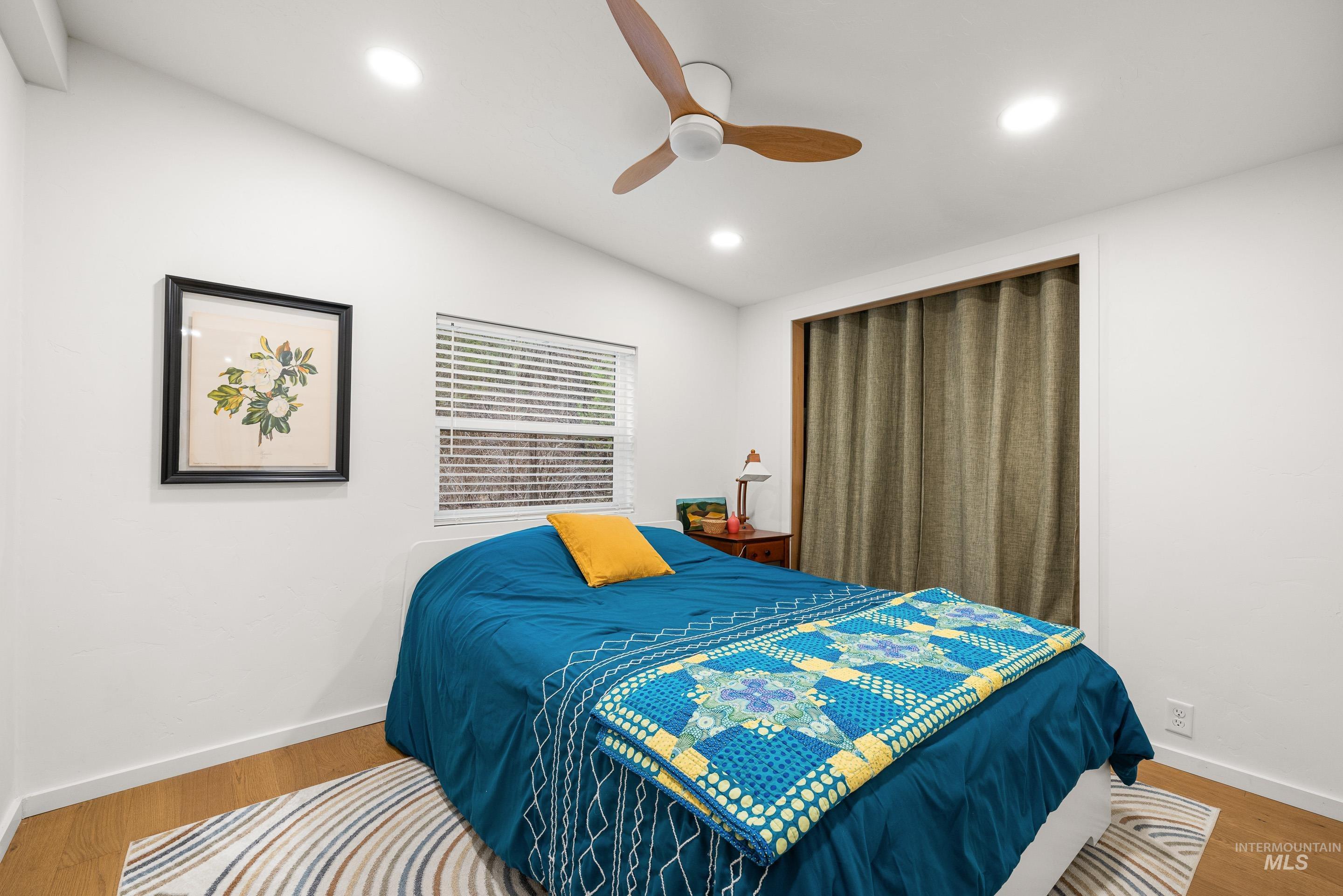 32 Sky Ridge Drive Garden Valley, ID 83622 - Photo 20 of 37 Bedroom with wood finished floors, ceiling fan, and recessed lighting